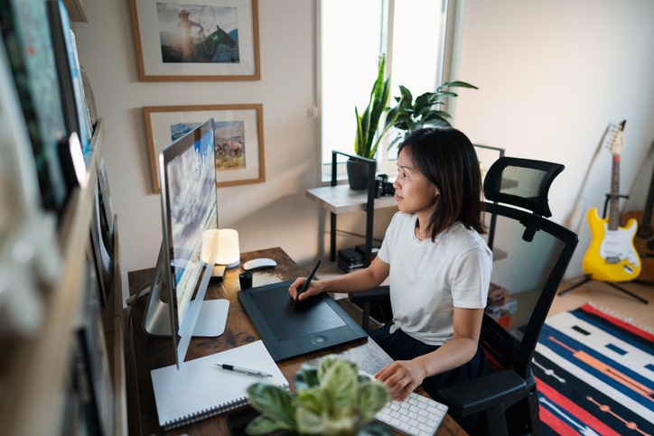 female graphic designer working from home